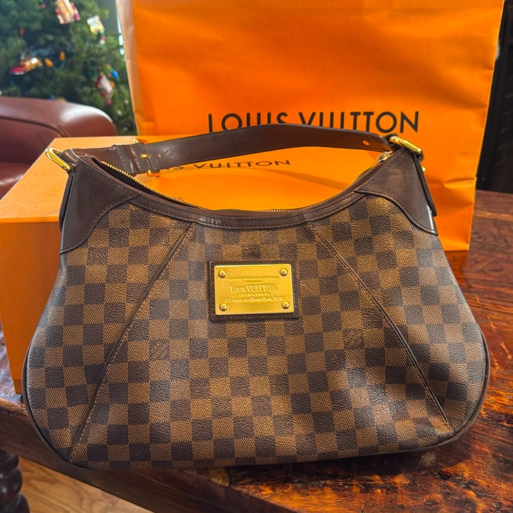 Louis Vuitton Inventeur women’s handbag
